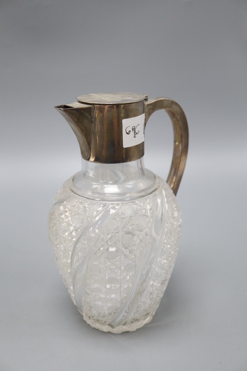 A Victorian silver mounted cut glass claret jug, makers Hukin & Heath, London 1891, H.23cm